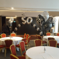 Medium arch with large numbers incorporated at Hilton Glasgow