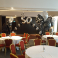 Medium arch with large numbers incorporated at Hilton Glasgow